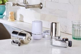 A variety of faucet water filters on a kitchen countertop